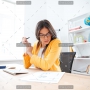 demo-attachment-449-businesswoman-analysing-document-P8WSNMC